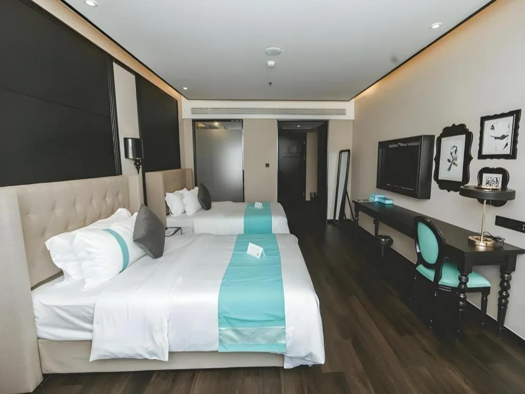 Bed in Xana Hotelle Binzhou Yangxin