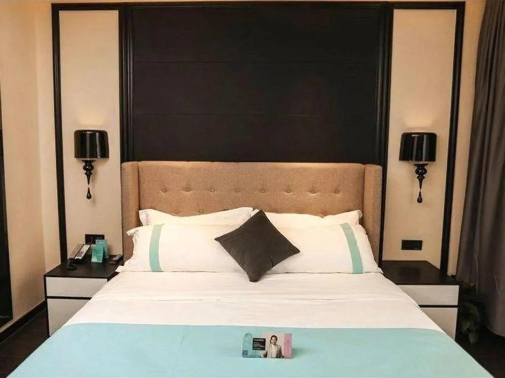 Bed in Xana Hotelle Binzhou Yangxin