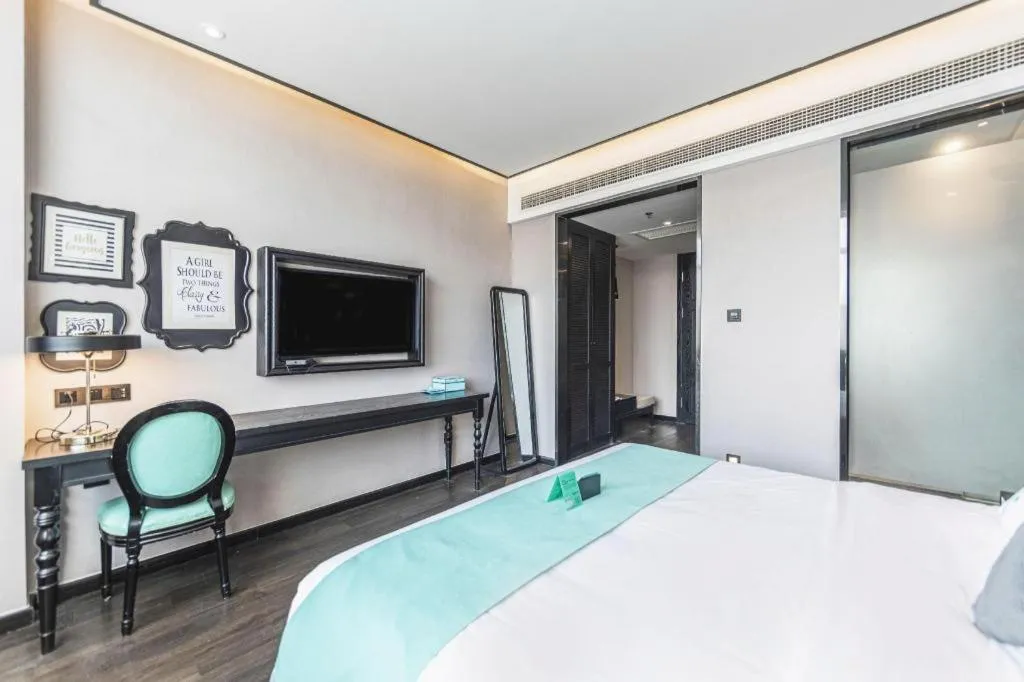 Bed in Xana Hotelle Binzhou Yangxin