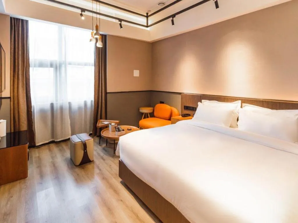 Bed in ZMAX Hotel Yan'an Baimi Avenue Baotashan