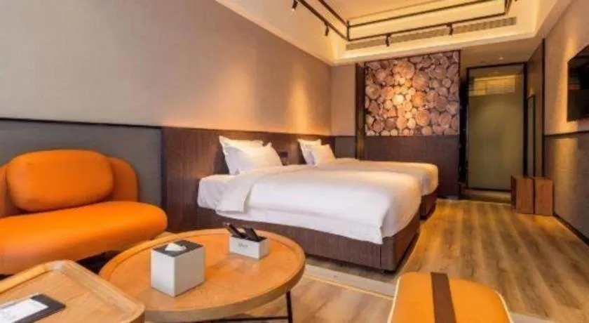Bed in ZMAX Hotel Yan'an Baimi Avenue Baotashan
