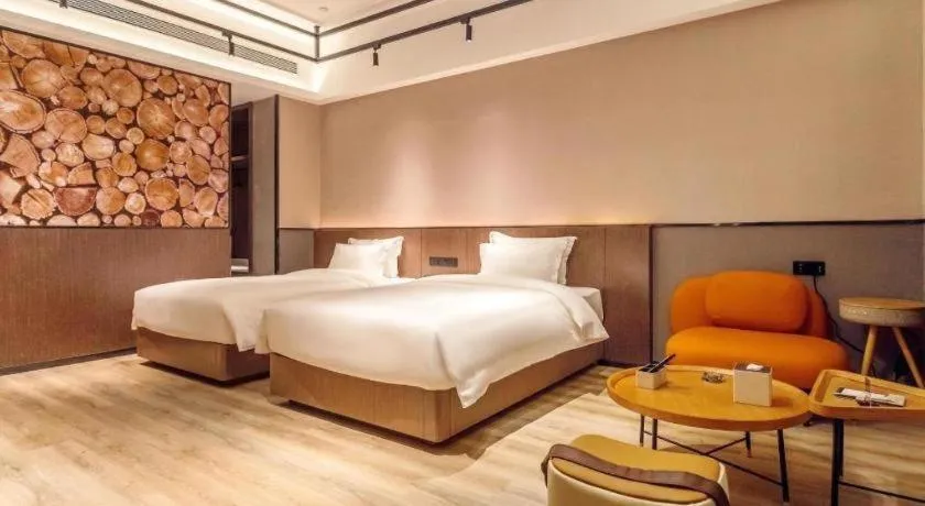 Bed in ZMAX Hotel Yan'an Baimi Avenue Baotashan
