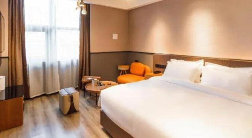 Bed in ZMAX Hotel Yan'an Baimi Avenue Baotashan