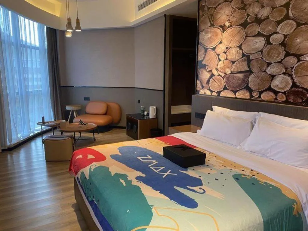 Bed in ZMAX Hotel Yan'an Baimi Avenue Baotashan