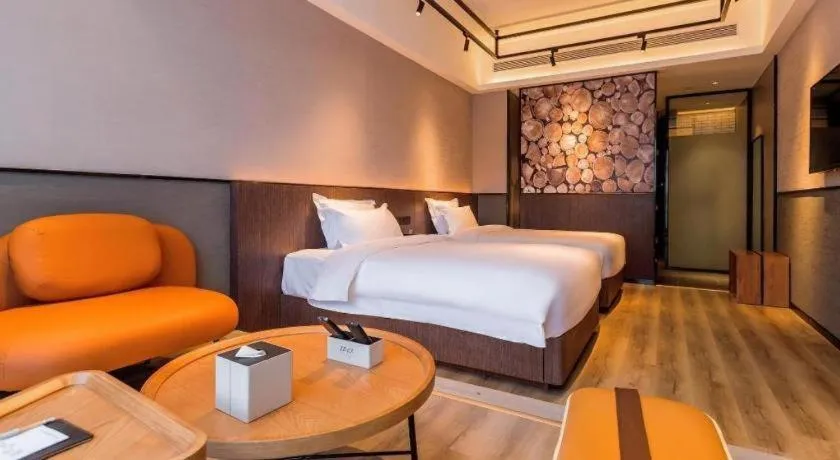 Bed in ZMAX Hotel Yan'an Baimi Avenue Baotashan