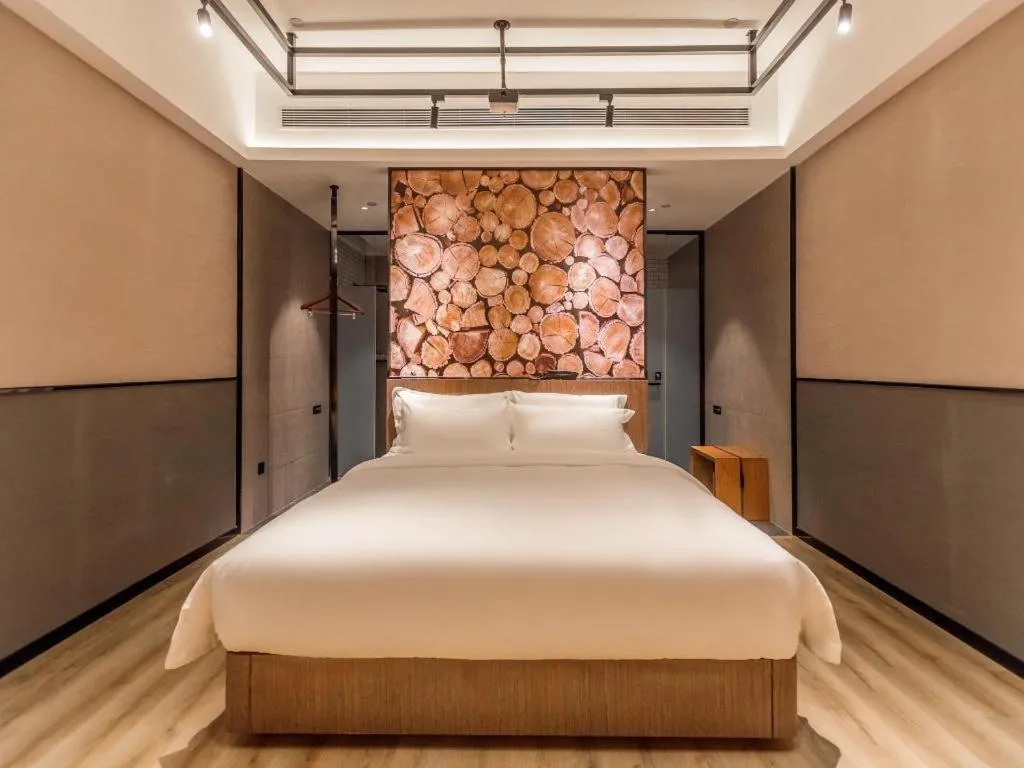 Bed in ZMAX Hotel Yan'an Baimi Avenue Baotashan