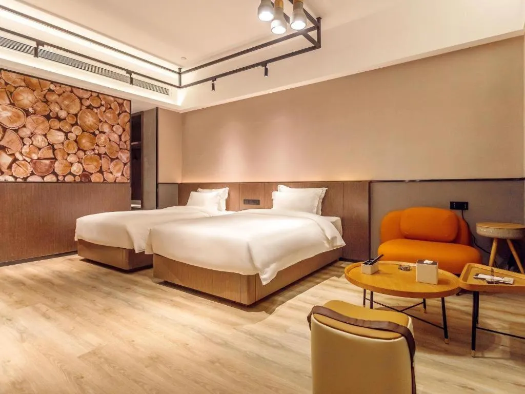 Bed in ZMAX Hotel Yan'an Baimi Avenue Baotashan