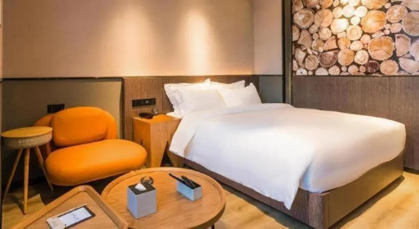 Bed in ZMAX Hotel Yan'an Baimi Avenue Baotashan