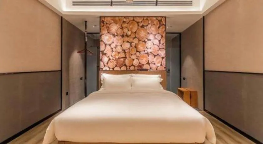 Bed in ZMAX Hotel Yan'an Baimi Avenue Baotashan