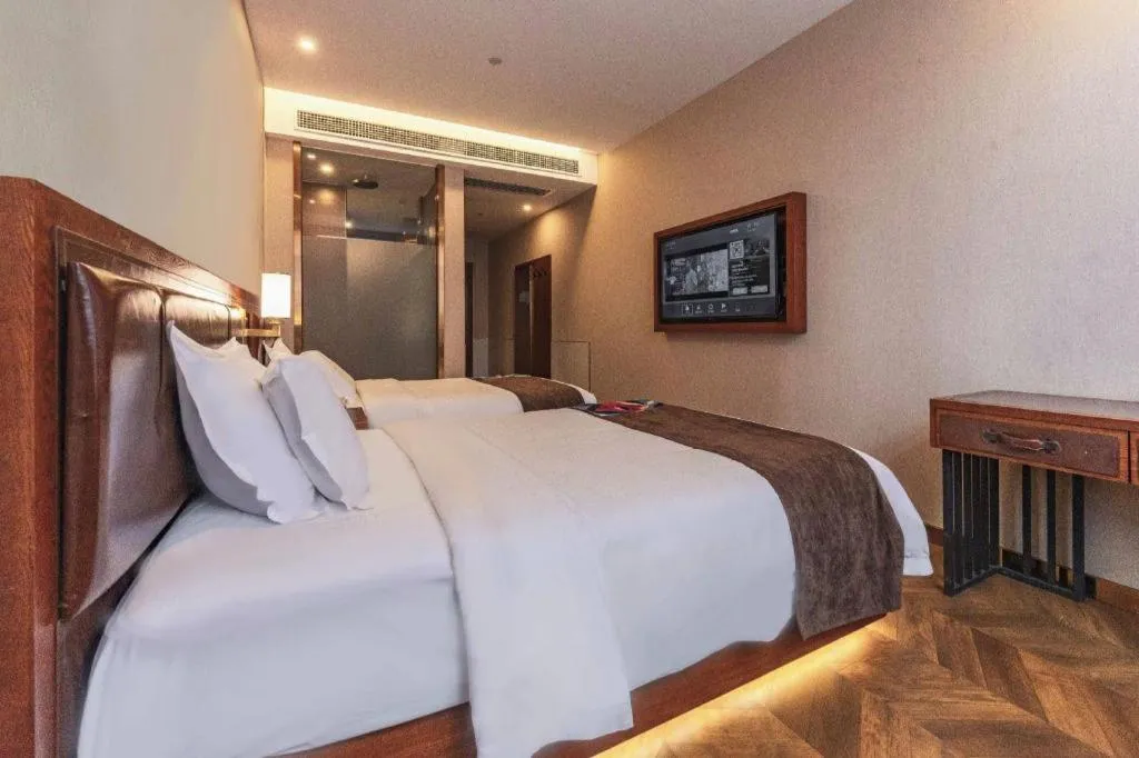 Bed in James Joyce Coffetel Tianjing First Central Hospital Nankai University