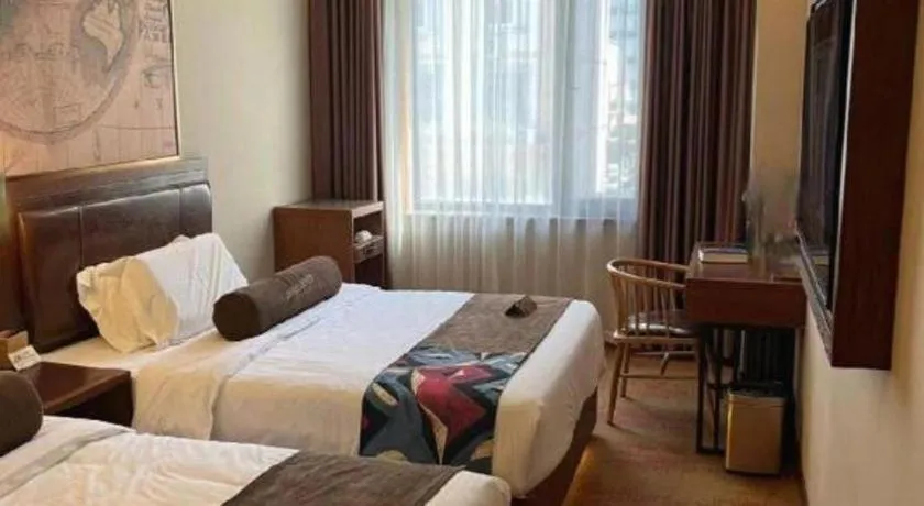 Bed in James Joyce Coffetel Tianjing First Central Hospital Nankai University