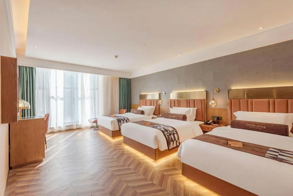 Bed in James Joyce Coffetel Tianjing First Central Hospital Nankai University