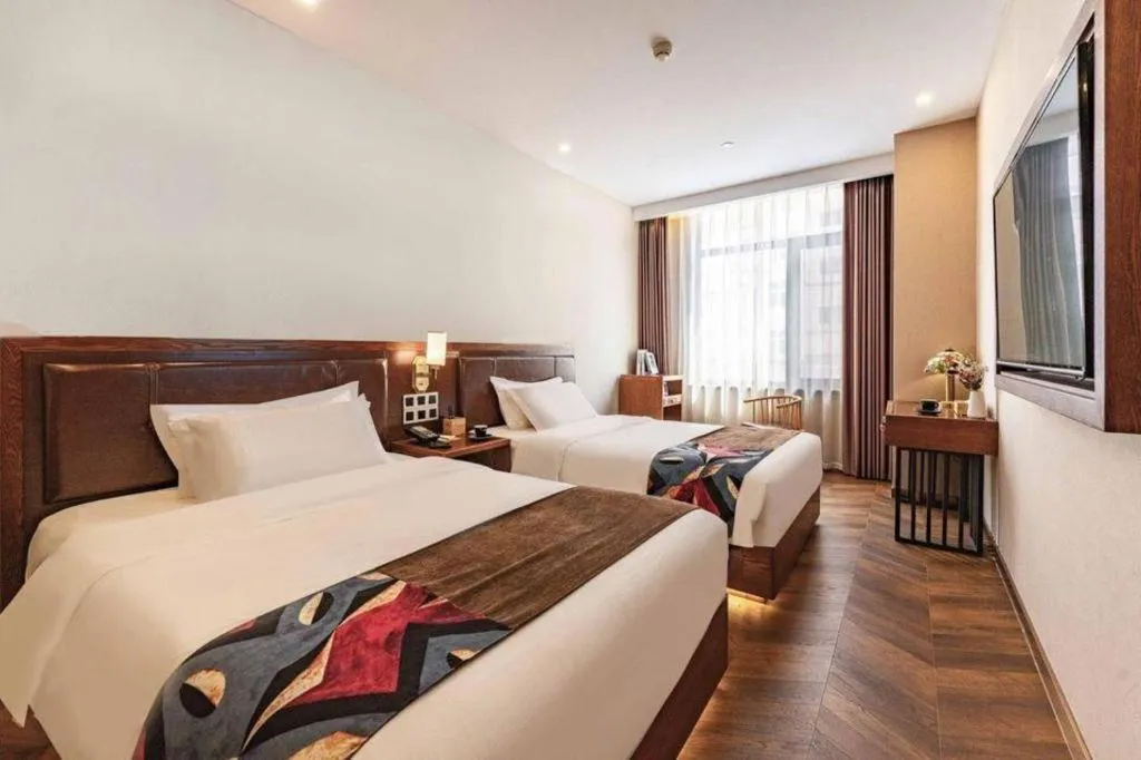 Bed in James Joyce Coffetel Tianjing First Central Hospital Nankai University