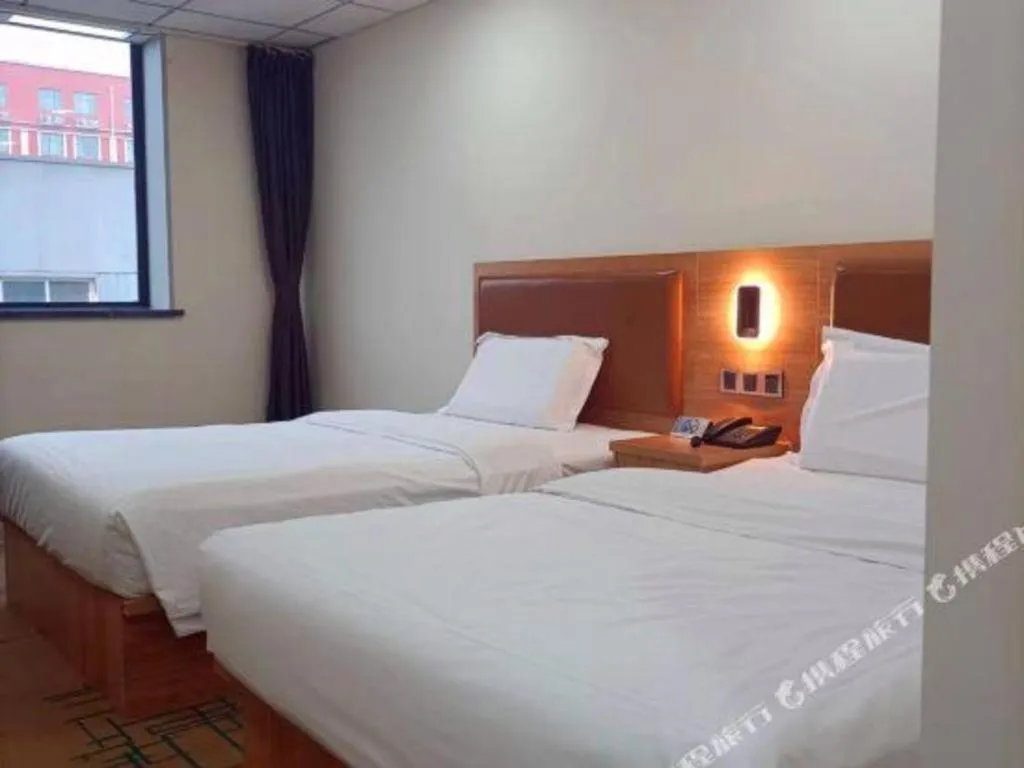 Bed in James Joyce Coffetel Beijing Yizhuang Development Zone Chicheng Times Square