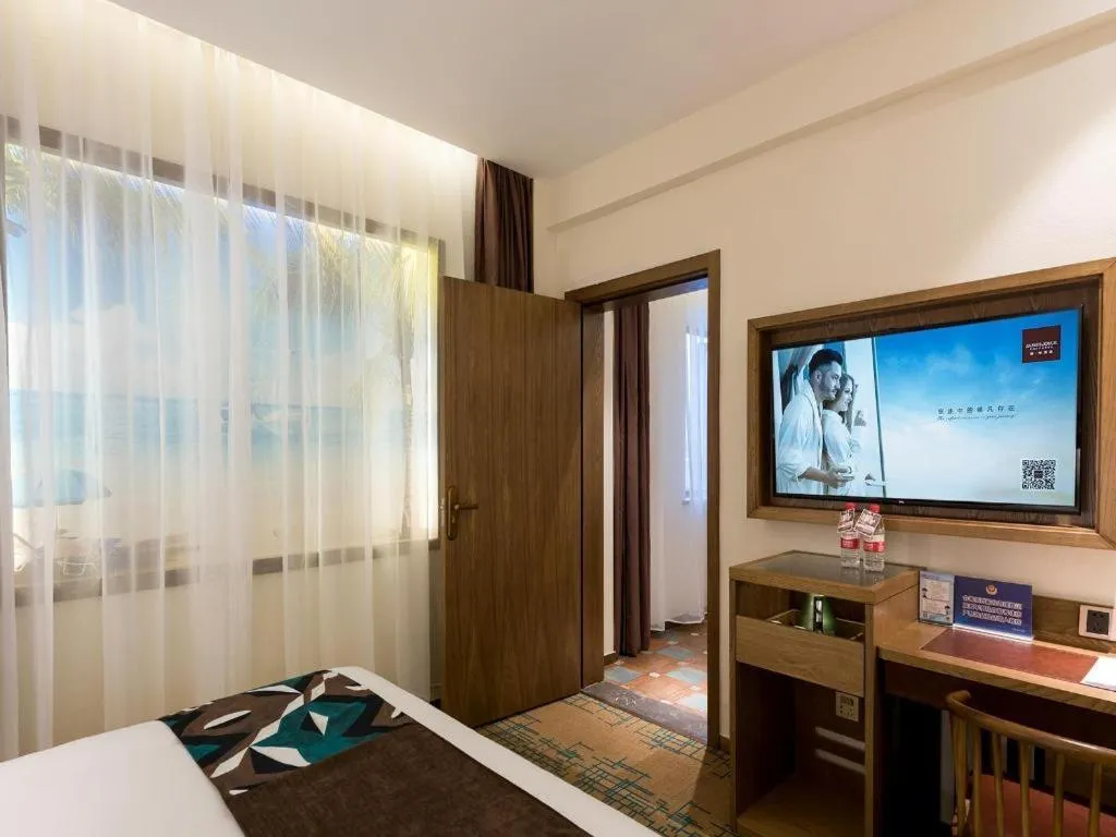Bed in James Joyce Coffetel Beijing Yizhuang Development Zone Chicheng Times Square