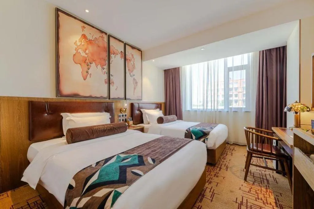 Bed in James Joyce Coffetel Beijing Yizhuang Development Zone Chicheng Times Square