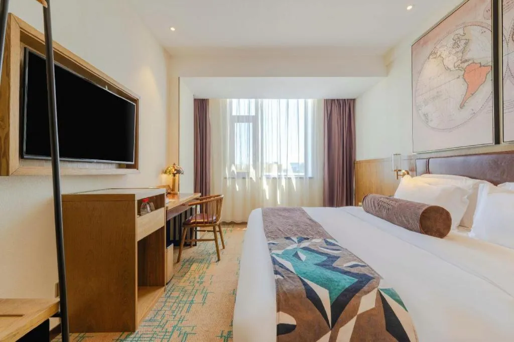 Bed in James Joyce Coffetel Beijing Yizhuang Development Zone Chicheng Times Square