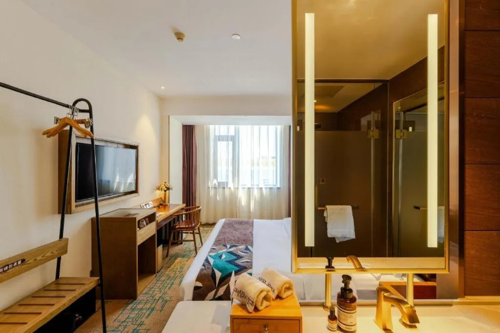 Bed in James Joyce Coffetel Beijing Yizhuang Development Zone Chicheng Times Square