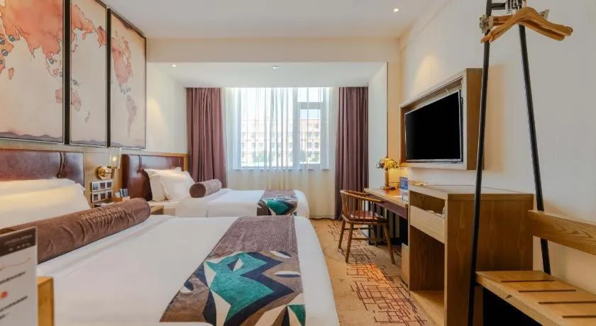 Bed in James Joyce Coffetel Beijing Yizhuang Development Zone Chicheng Times Square