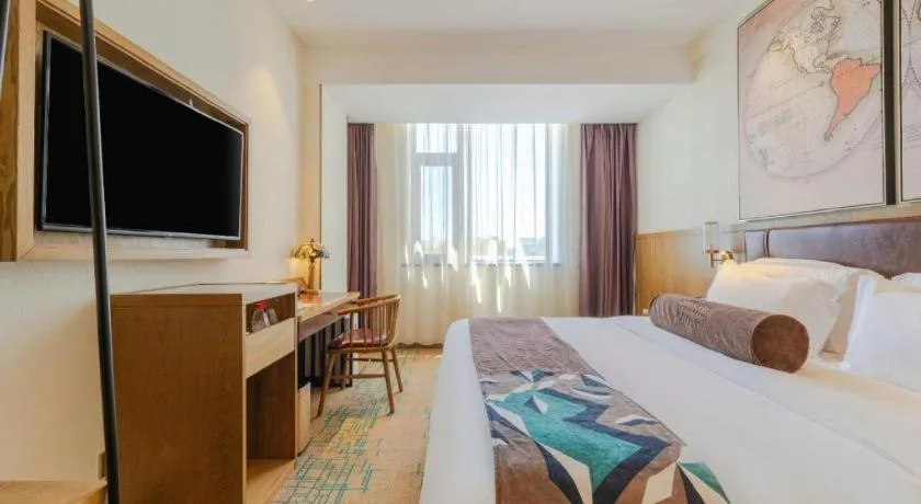 Bed in James Joyce Coffetel Beijing Yizhuang Development Zone Chicheng Times Square