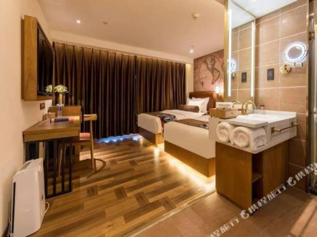 Bed in James Joyce Coffetel Beijing Yizhuang Development Zone Chicheng Times Square