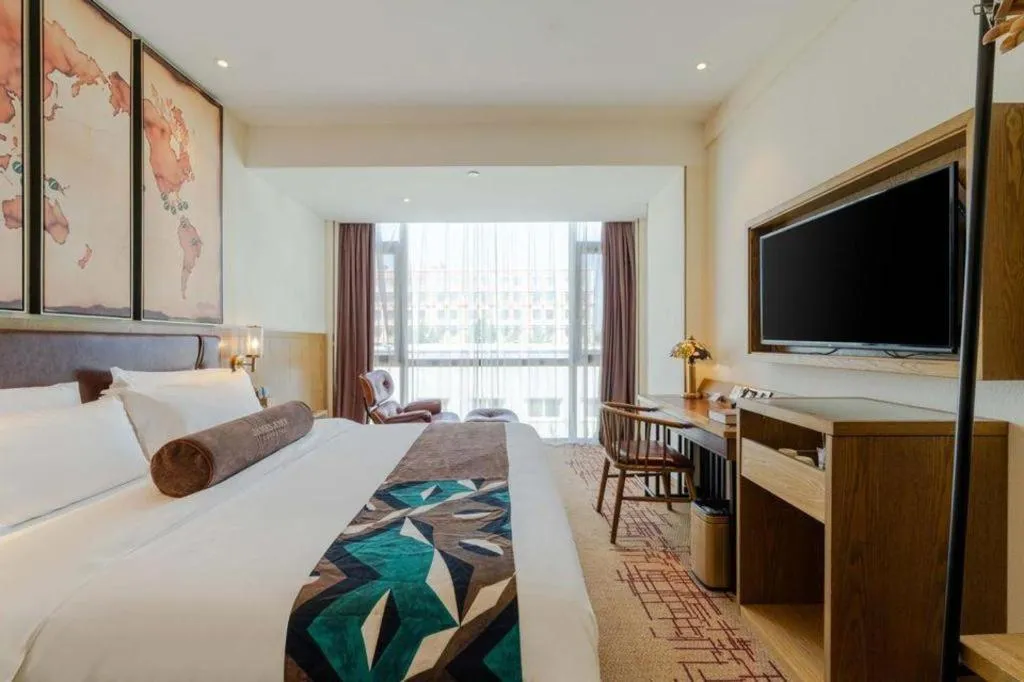 Bed in James Joyce Coffetel Beijing Yizhuang Development Zone Chicheng Times Square