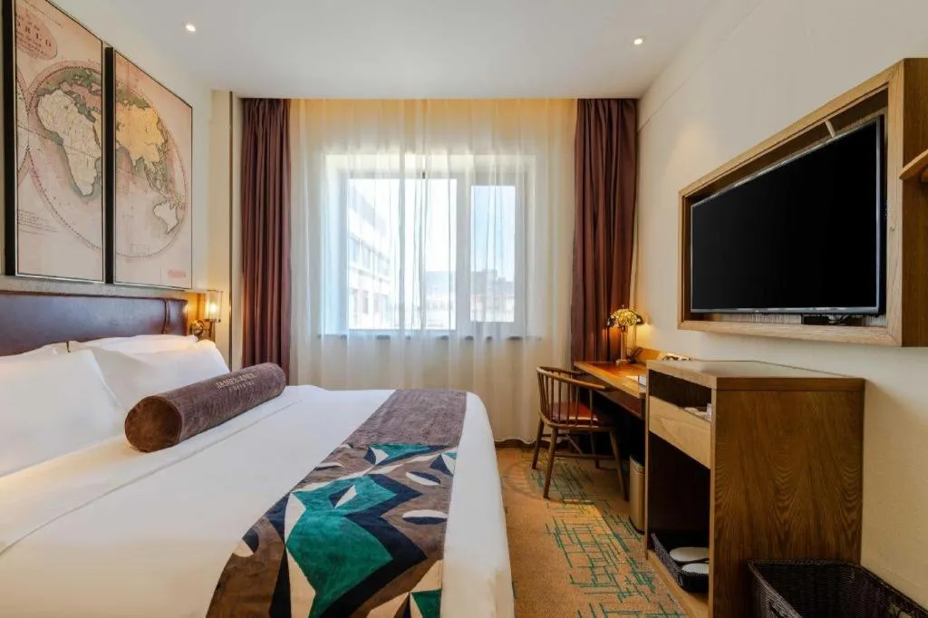 Bed in James Joyce Coffetel Beijing Yizhuang Development Zone Chicheng Times Square