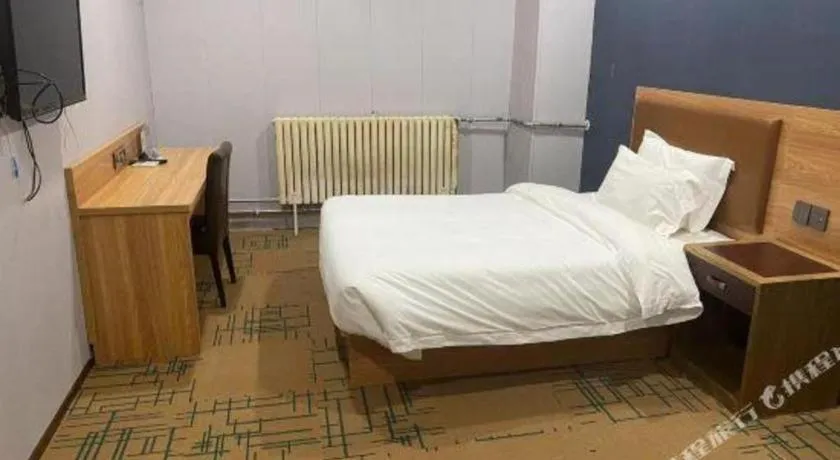 Bed in James Joyce Coffetel Beijing Yizhuang Development Zone Chicheng Times Square