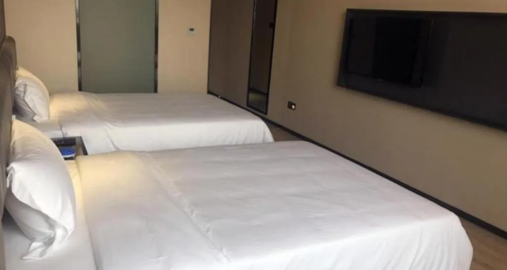 Bed in IU Hotel Lanzhou New District Airport Ruiling International