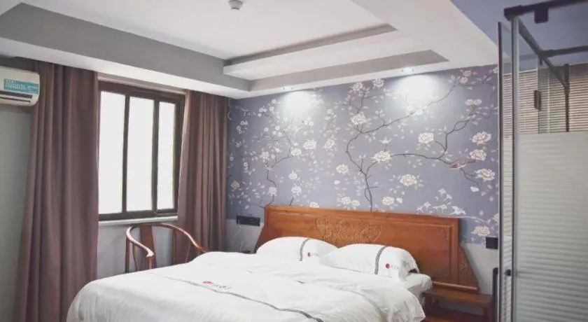 Bed in Pai Hotel Huai'an Lianshui Huaipu Bei Road