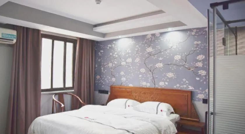 Bed in Pai Hotel Huai'an Lianshui Huaipu Bei Road