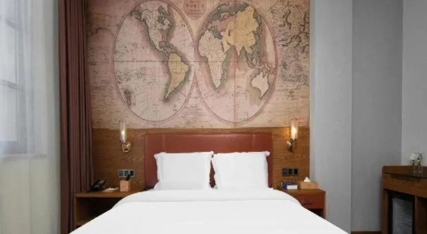 Bed in James Joyce Coffetel Luoyang Longmen High-speed Railway Station Baolong Plaza