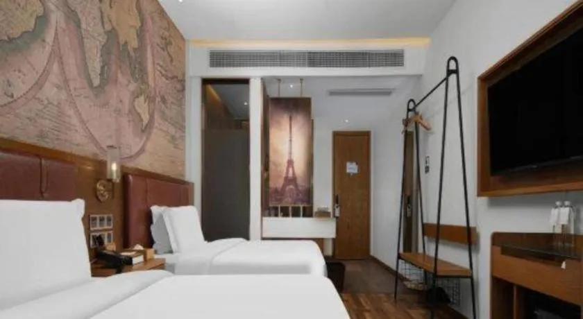 Bed in James Joyce Coffetel Luoyang Longmen High-speed Railway Station Baolong Plaza