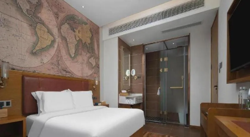 Bed in James Joyce Coffetel Luoyang Longmen High-speed Railway Station Baolong Plaza