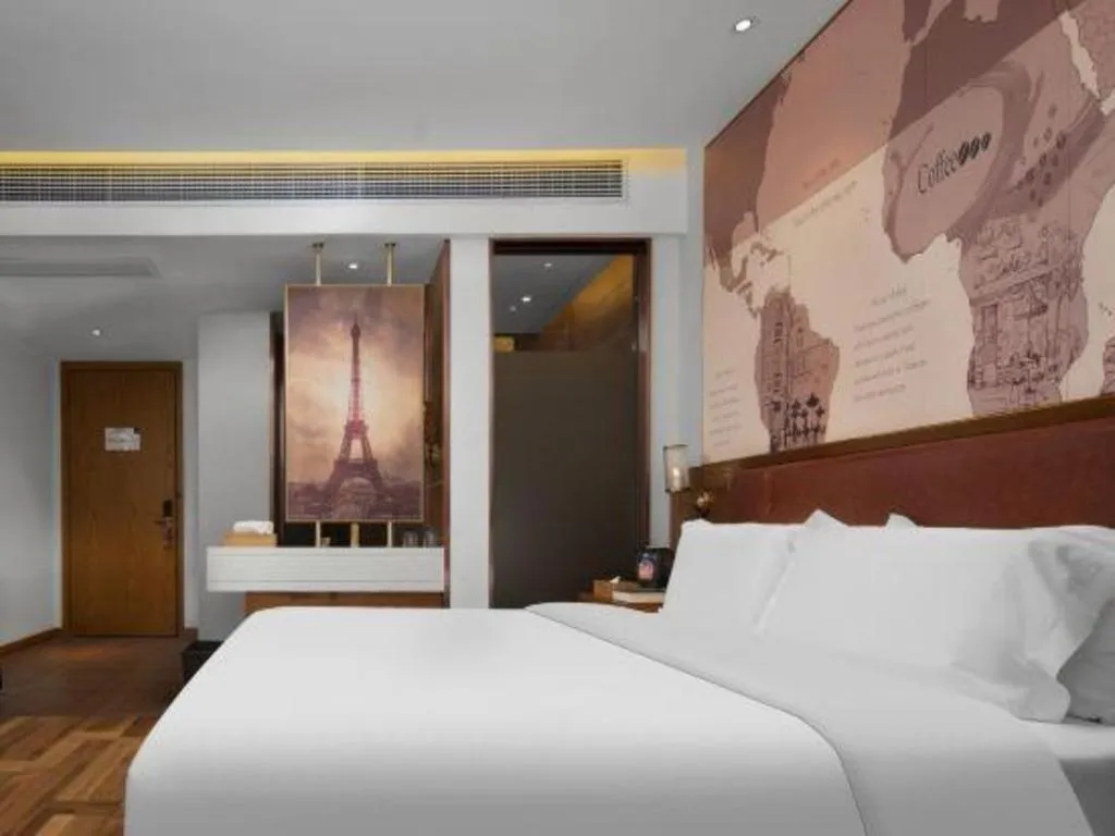 Bed in James Joyce Coffetel Luoyang Longmen High-speed Railway Station Baolong Plaza