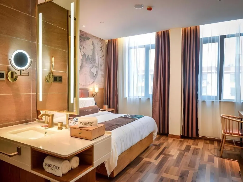 Bed in James Joyce Coffetel Luoyang Longmen High-speed Railway Station Baolong Plaza