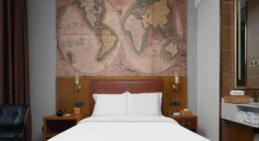 Bed in James Joyce Coffetel Luoyang Longmen High-speed Railway Station Baolong Plaza