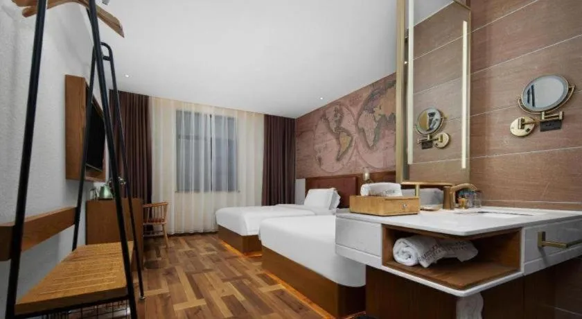 Bed in James Joyce Coffetel Luoyang Longmen High-speed Railway Station Baolong Plaza