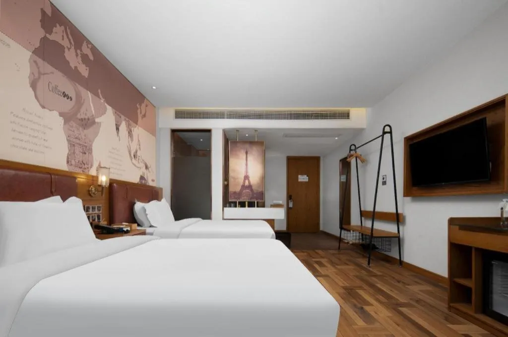 Bed in James Joyce Coffetel Luoyang Longmen High-speed Railway Station Baolong Plaza