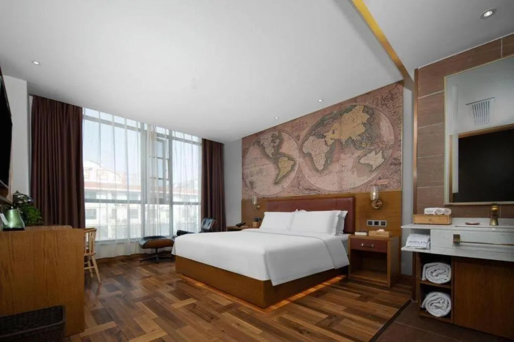 Bed in James Joyce Coffetel Luoyang Longmen High-speed Railway Station Baolong Plaza