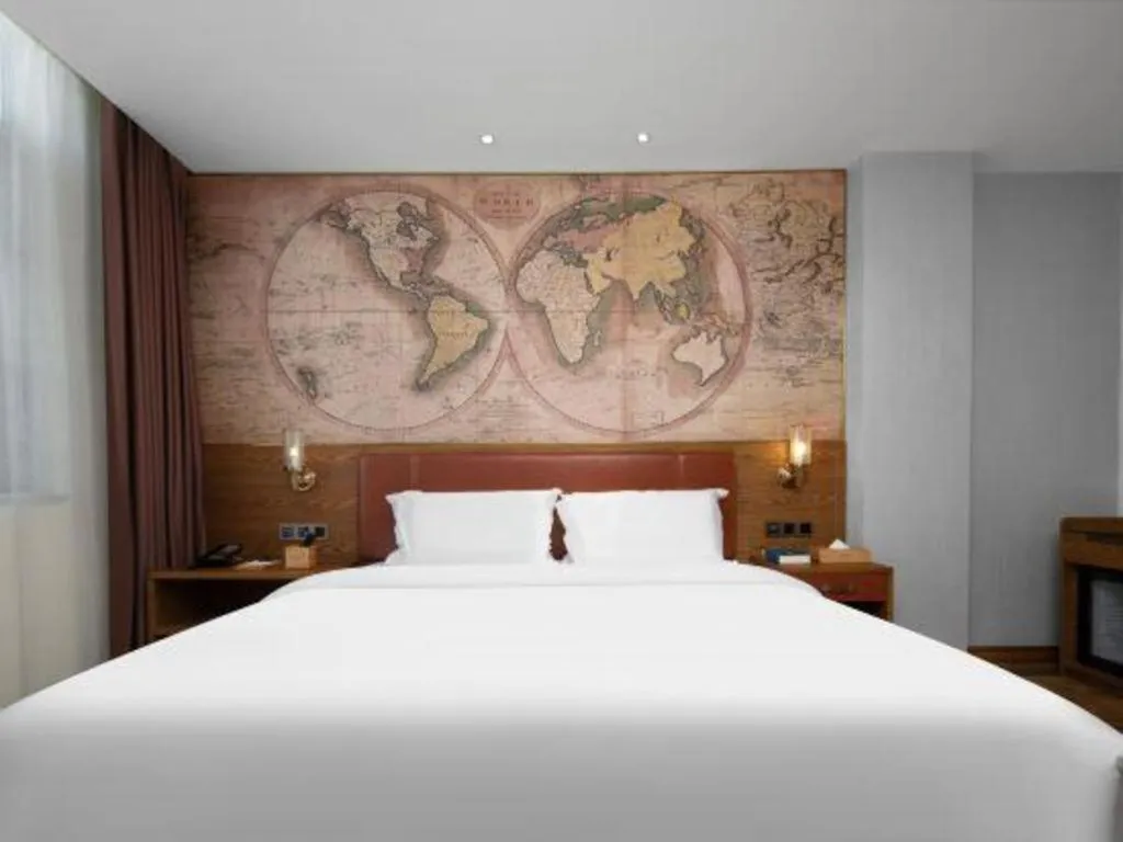 Bed in James Joyce Coffetel Luoyang Longmen High-speed Railway Station Baolong Plaza