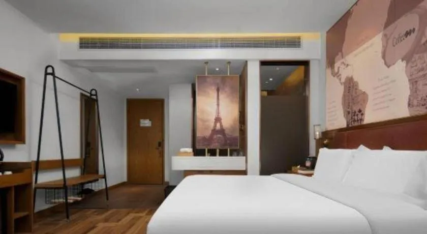 Bed in James Joyce Coffetel Luoyang Longmen High-speed Railway Station Baolong Plaza