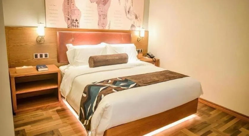 Bed in James Joyce Coffetel Luoyang Longmen High-speed Railway Station Baolong Plaza