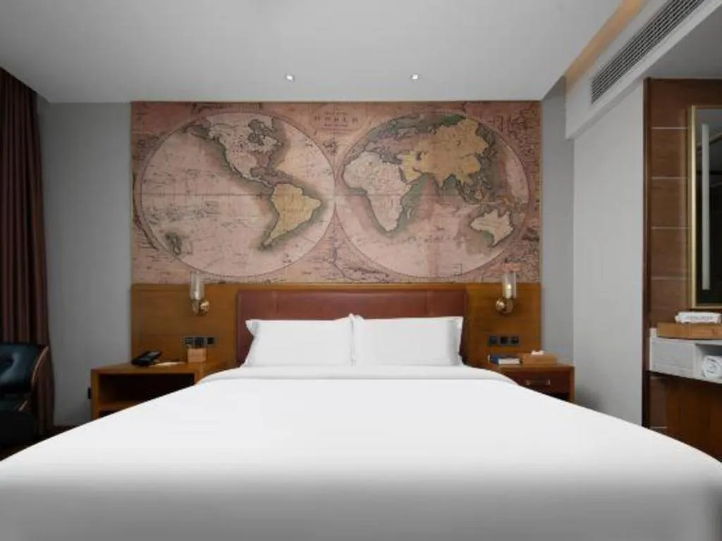 Bed in James Joyce Coffetel Luoyang Longmen High-speed Railway Station Baolong Plaza