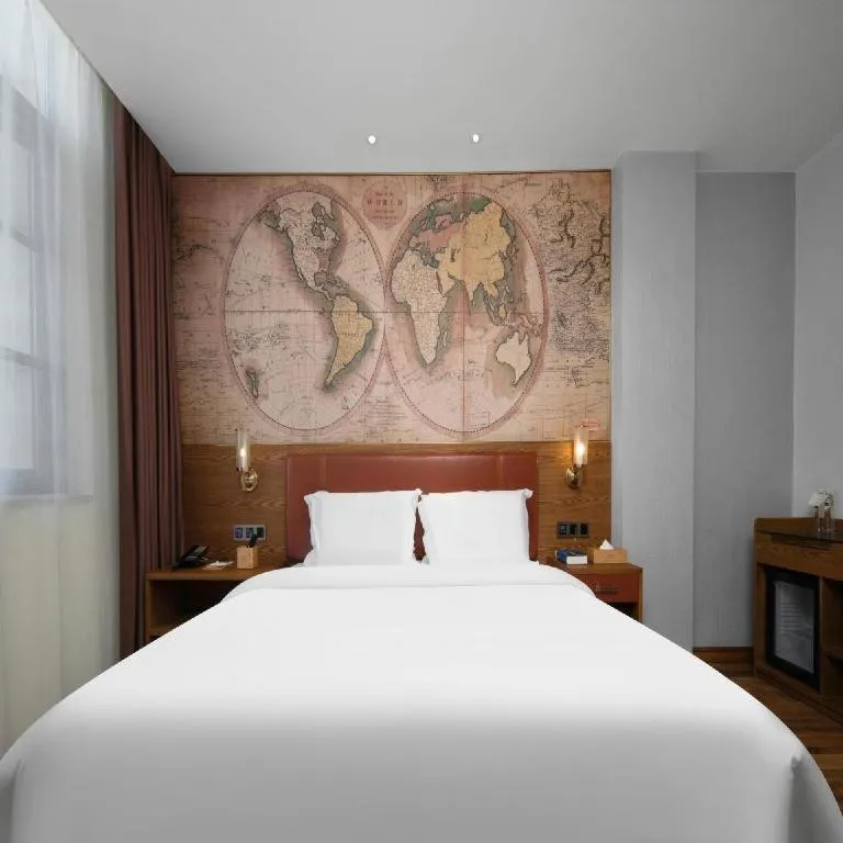 Bed in James Joyce Coffetel Luoyang Longmen High-speed Railway Station Baolong Plaza