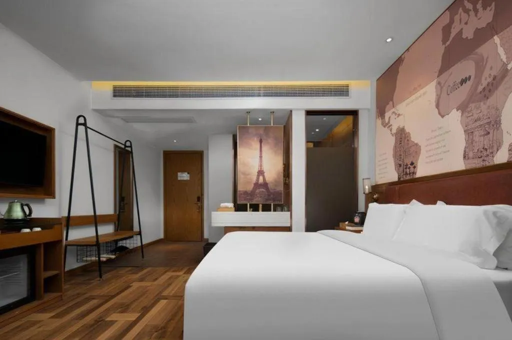 Bed in James Joyce Coffetel Luoyang Longmen High-speed Railway Station Baolong Plaza
