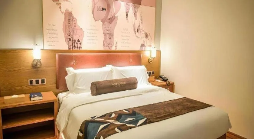 Bed in James Joyce Coffetel Luoyang Longmen High-speed Railway Station Baolong Plaza