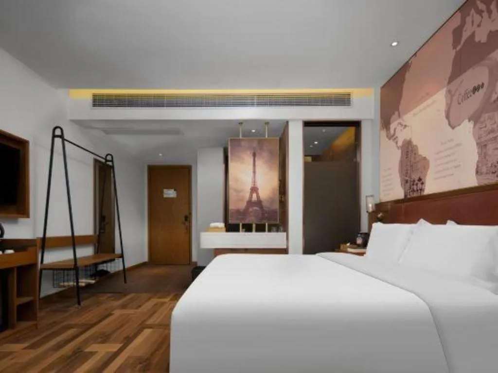 Bed in James Joyce Coffetel Luoyang Longmen High-speed Railway Station Baolong Plaza