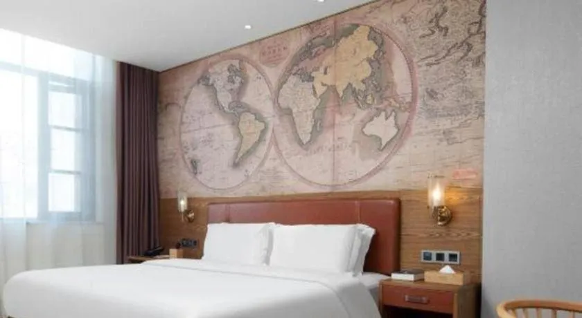 Bed in James Joyce Coffetel Luoyang Longmen High-speed Railway Station Baolong Plaza