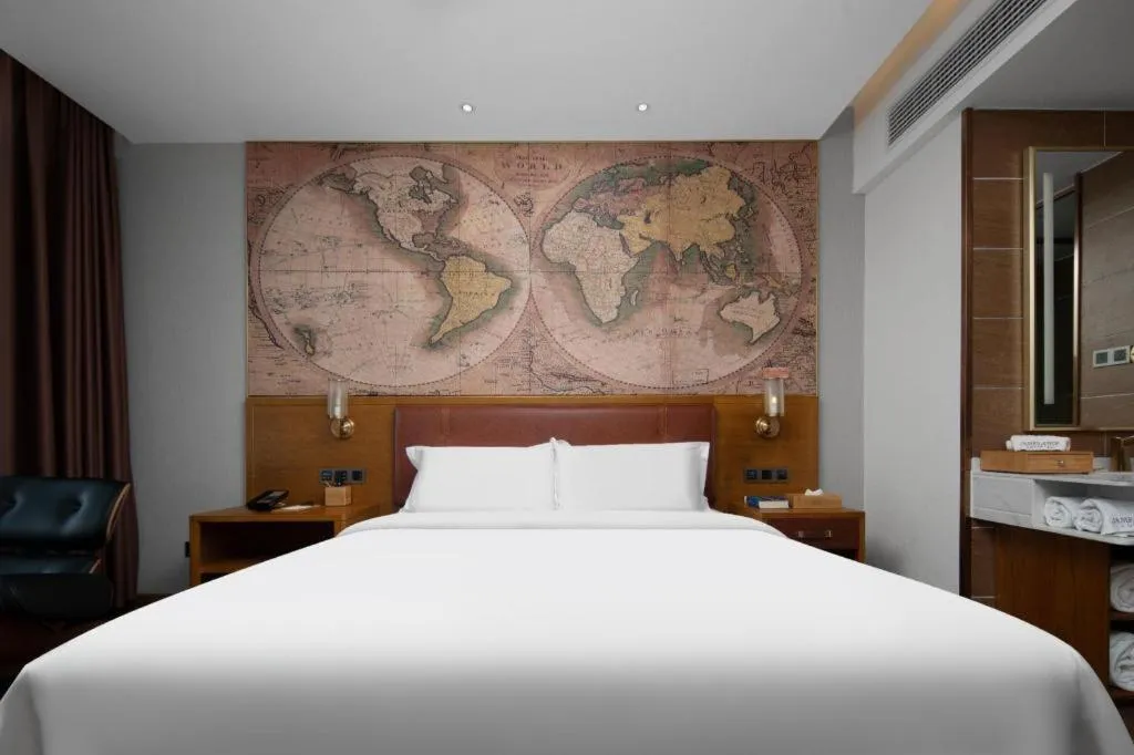 Bed in James Joyce Coffetel Luoyang Longmen High-speed Railway Station Baolong Plaza